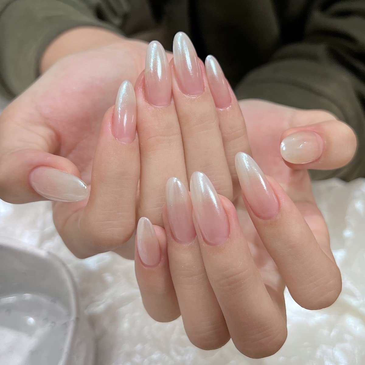Fokostar Aurora pearl nail art glow on nails.