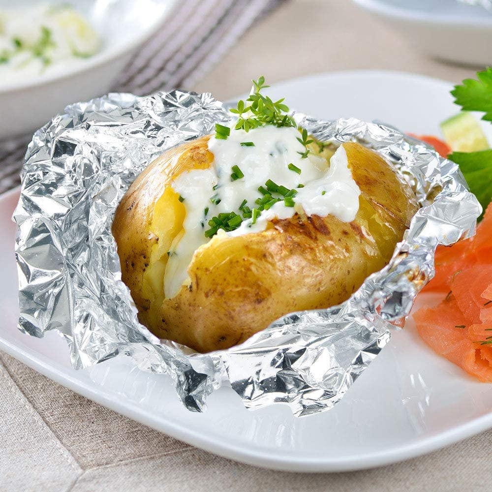 ForPro food-safe foil sheets for wrapping sandwiches and hot dishes.