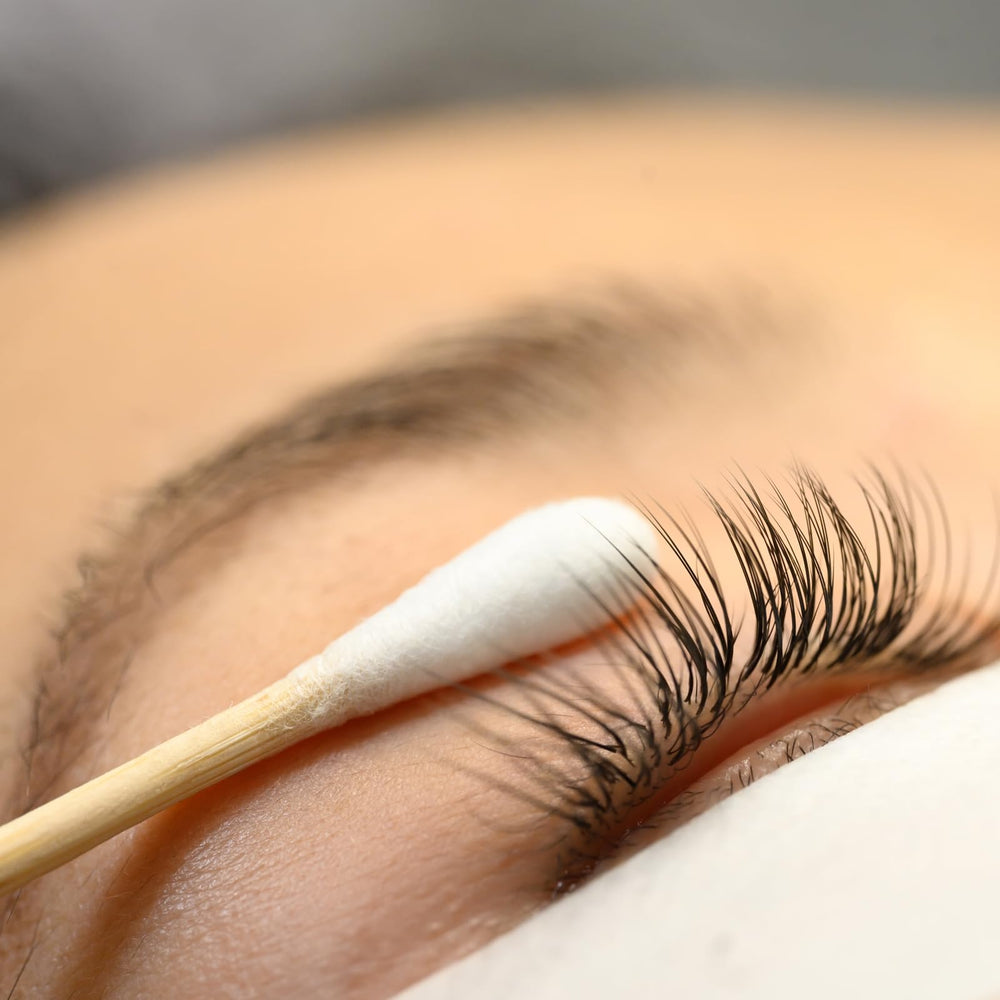 ForPro Premium cotton-tipped wood applicator used in clinic or spa settings.