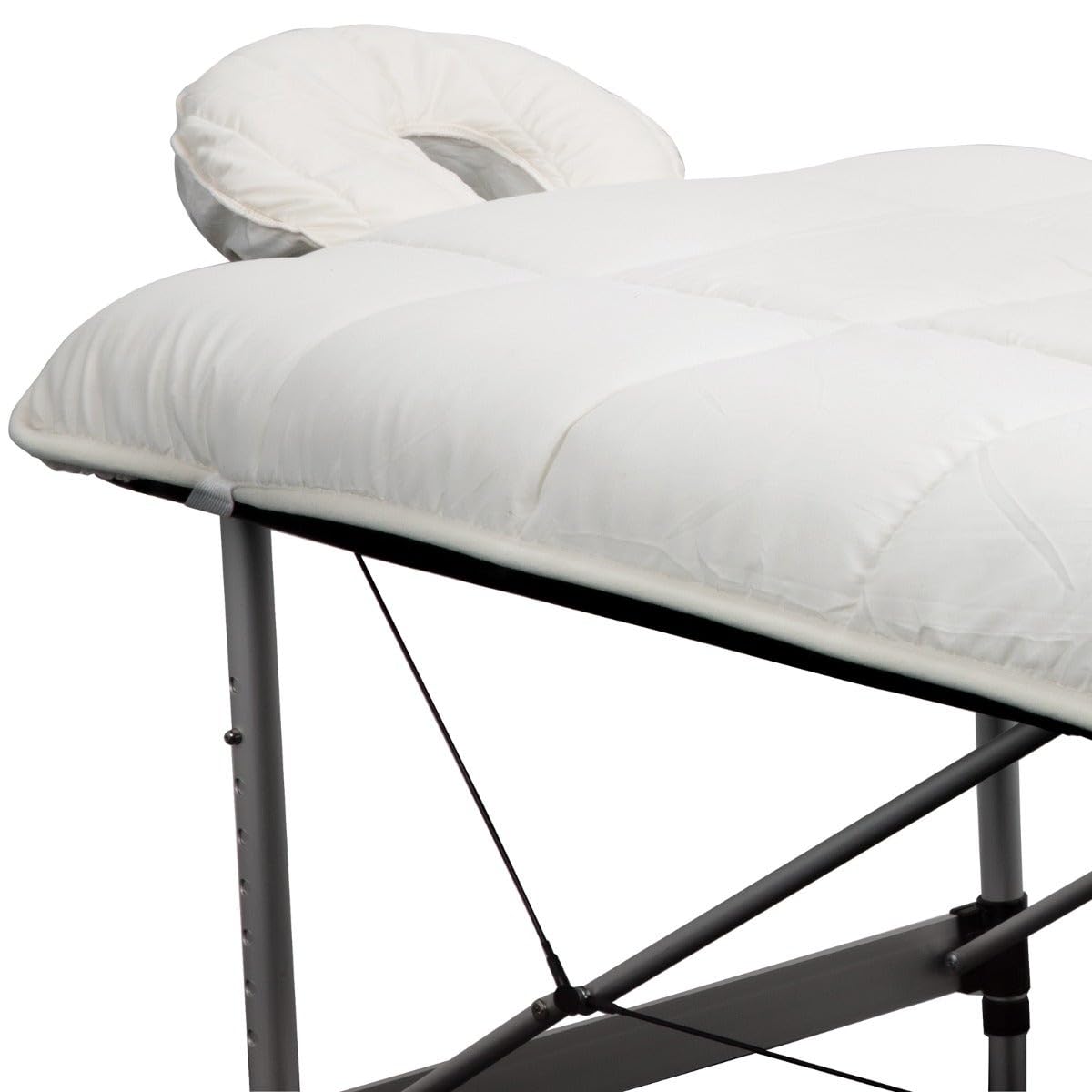 ForPro Premium Quilted Fleece Table Pad with strong elastic straps securing the pad in place.