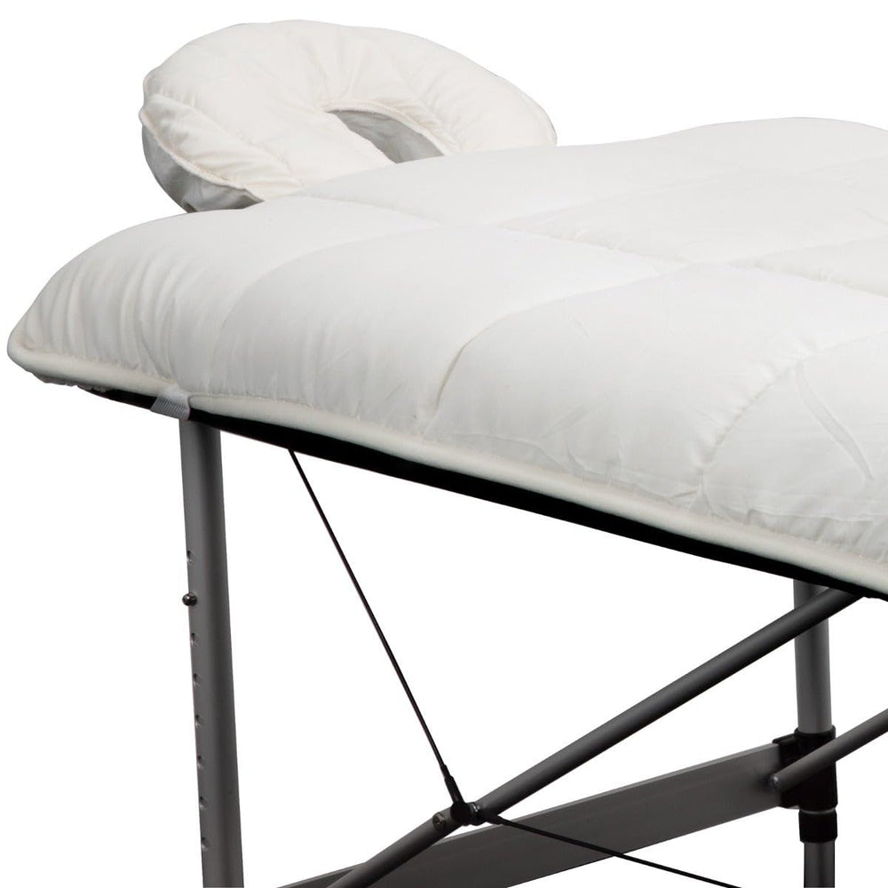 ForPro Premium Quilted Fleece Table Pad with strong elastic straps securing the pad in place.