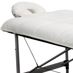 ForPro Premium Quilted Fleece Table Pad with strong elastic straps securing the pad in place.