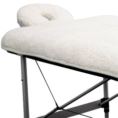 ForPro Premium Quilted Fleece Table Pad on a massage table provides extra cushioning for clients.