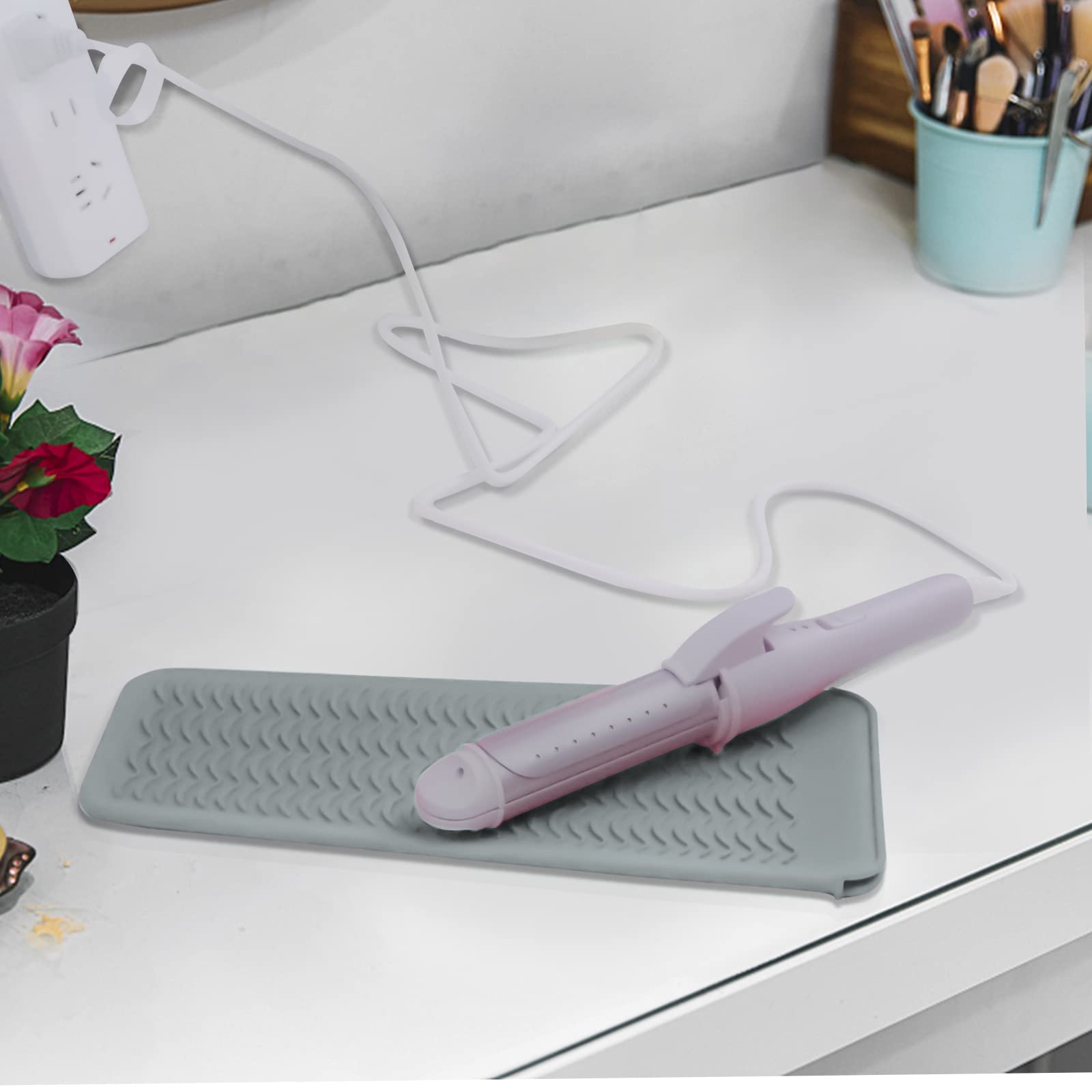 Fouews grey heat-protective surface complements any bathroom