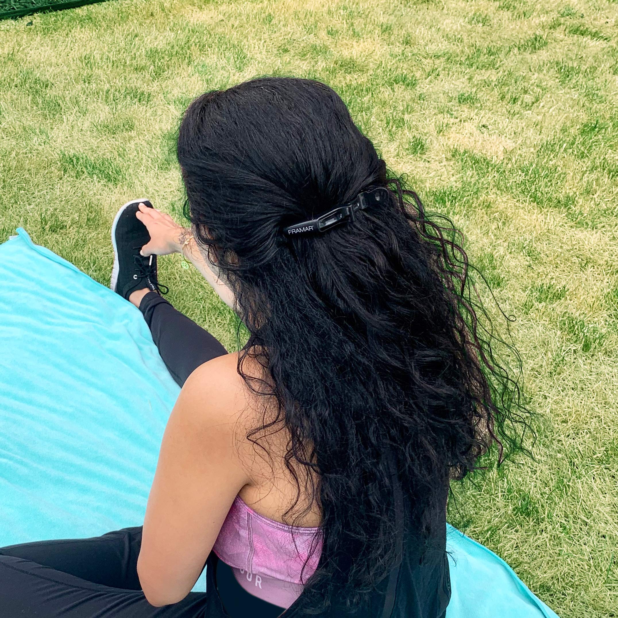 FRAMAR bun and braiding clip helps secure updos without tugging.