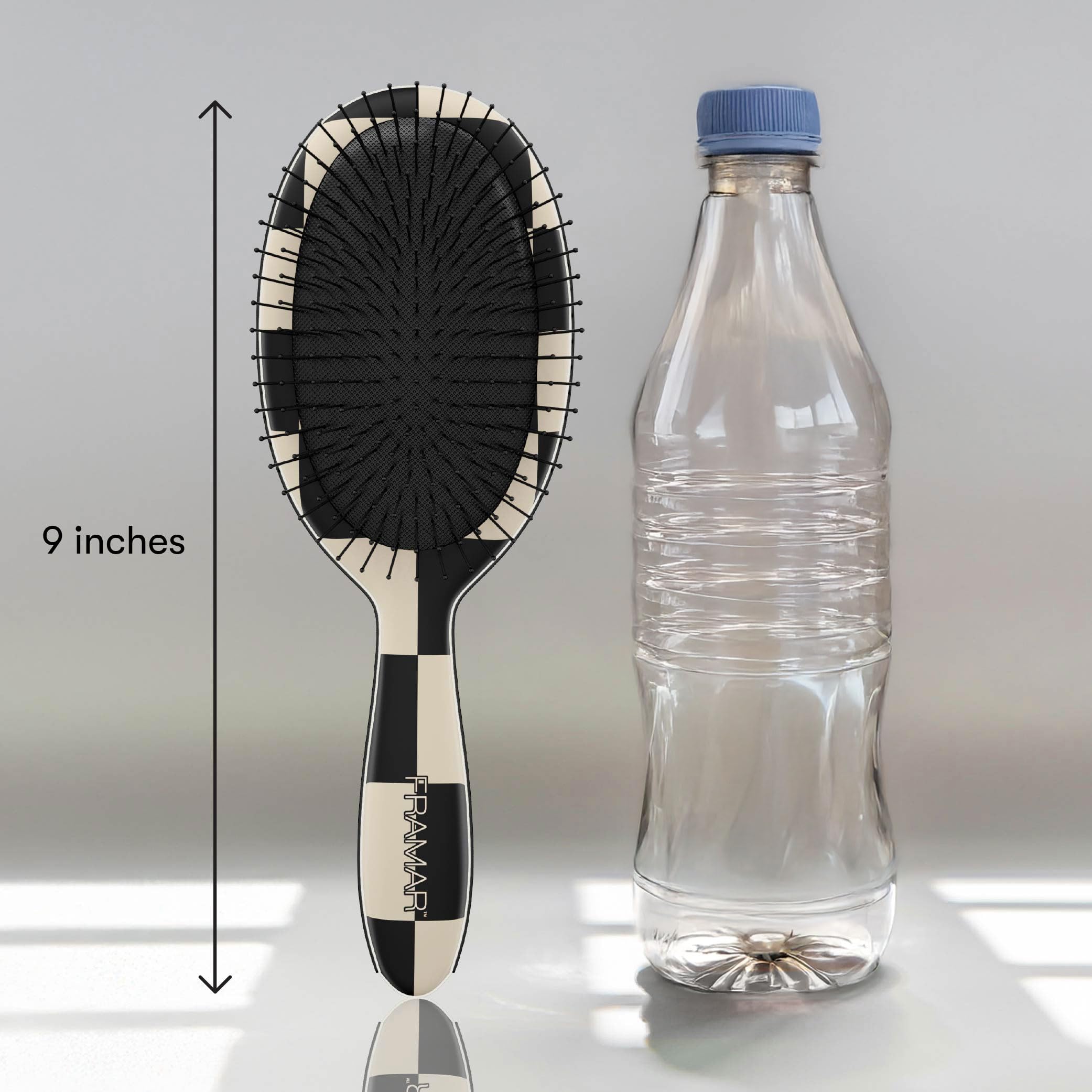 FRAMAR Checkered Detangler keeps bathroom tangles under control.