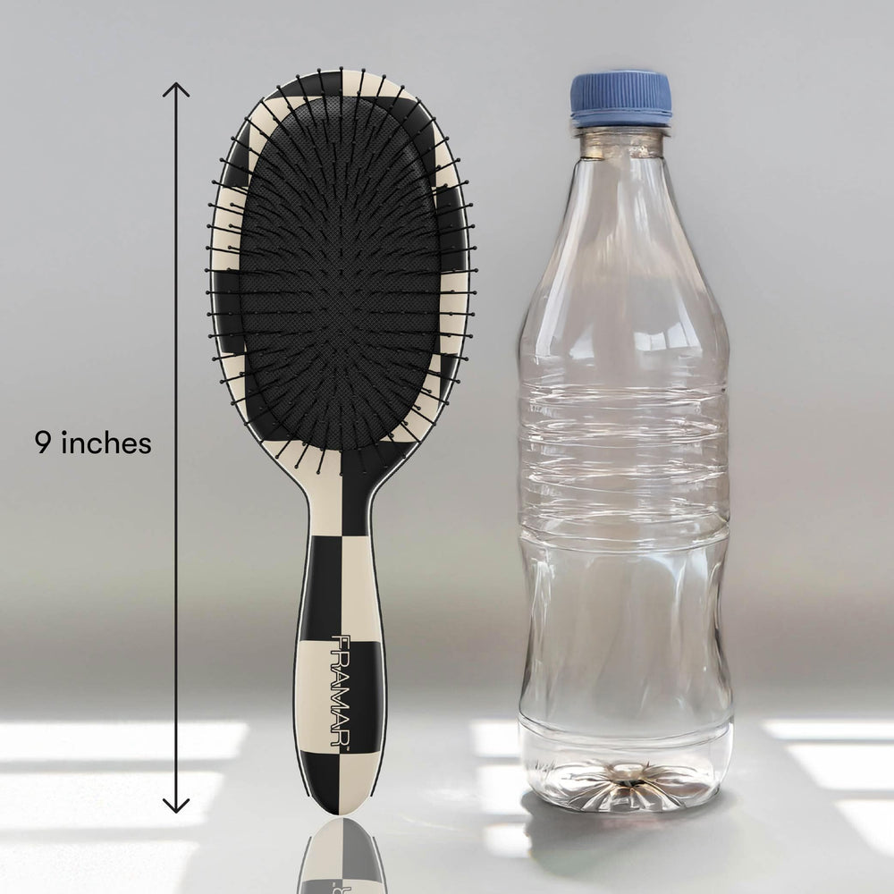 FRAMAR Checkered Detangler keeps bathroom tangles under control.