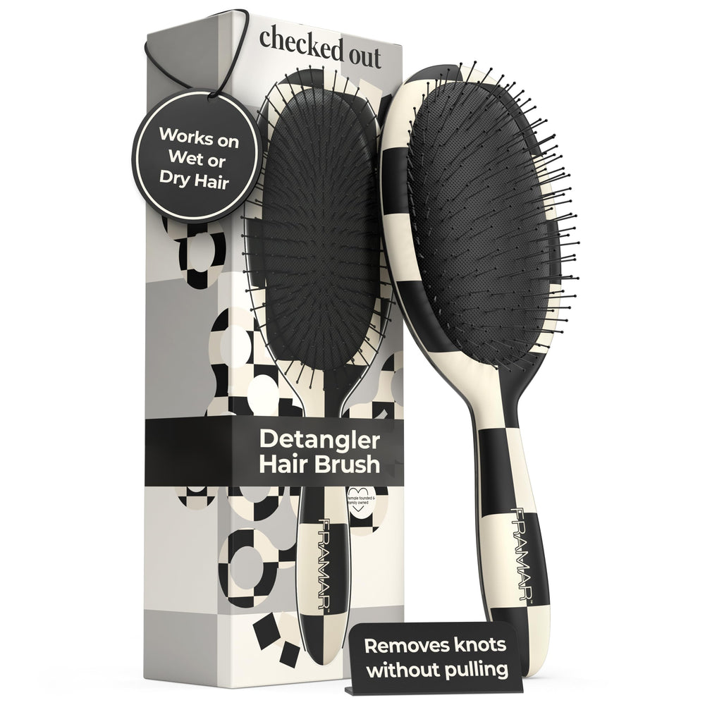 FRAMAR Checkered Detangler Brush with bristles eases tangling on all hair types.