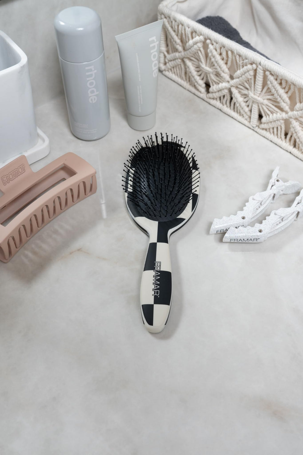 FRAMAR Checkered Brush fits in bags for on-the-go styling.