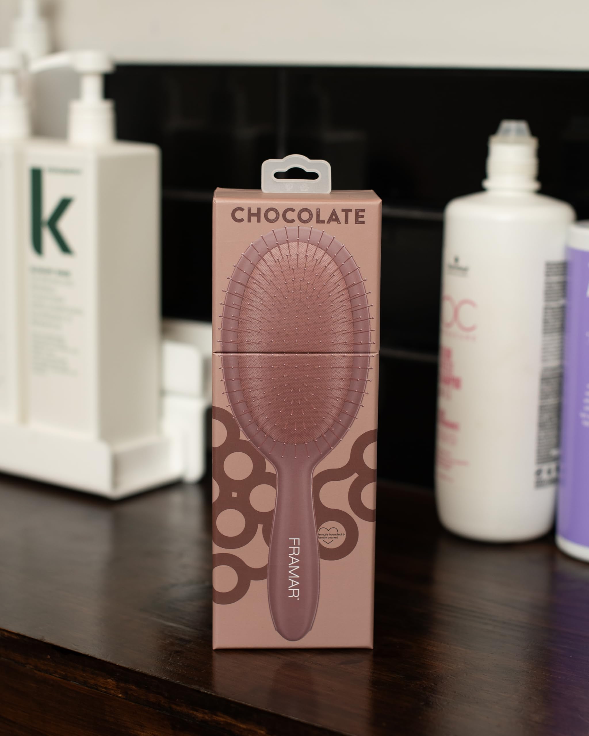 FRAMAR chocolate brush features an elegant design that enhances any vanity