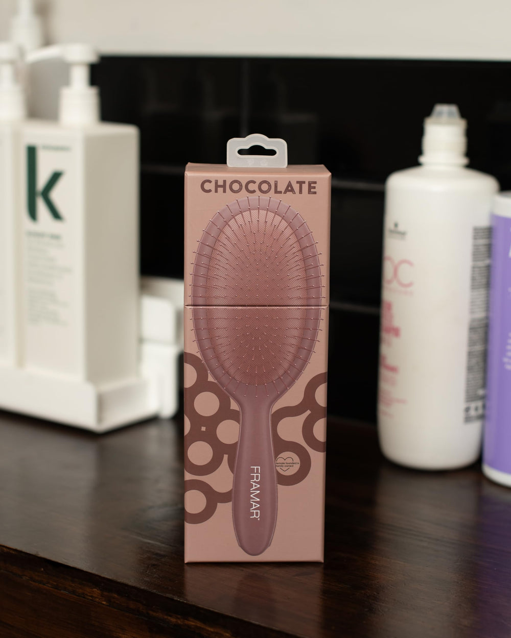 FRAMAR chocolate brush features an elegant design that enhances any vanity