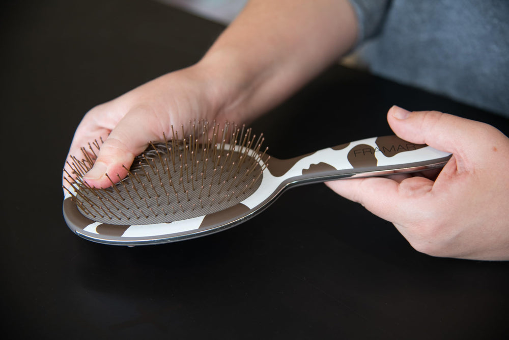 FRAMAR Cow Print Detangler fits purse for on-the-go touch-ups