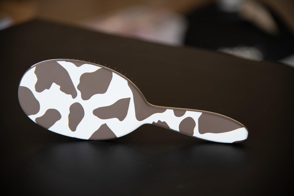 FRAMAR Cow Print Detangler on frizz control and smoother styling