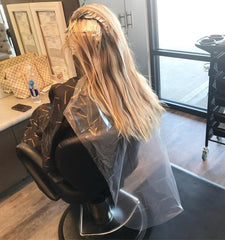 Framar hair dye cape is disposable for quick, mess-free color sessions.