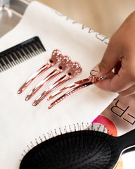 Framar pinzas oro rosa, uso profesional en coloración con sujeción ajustable.