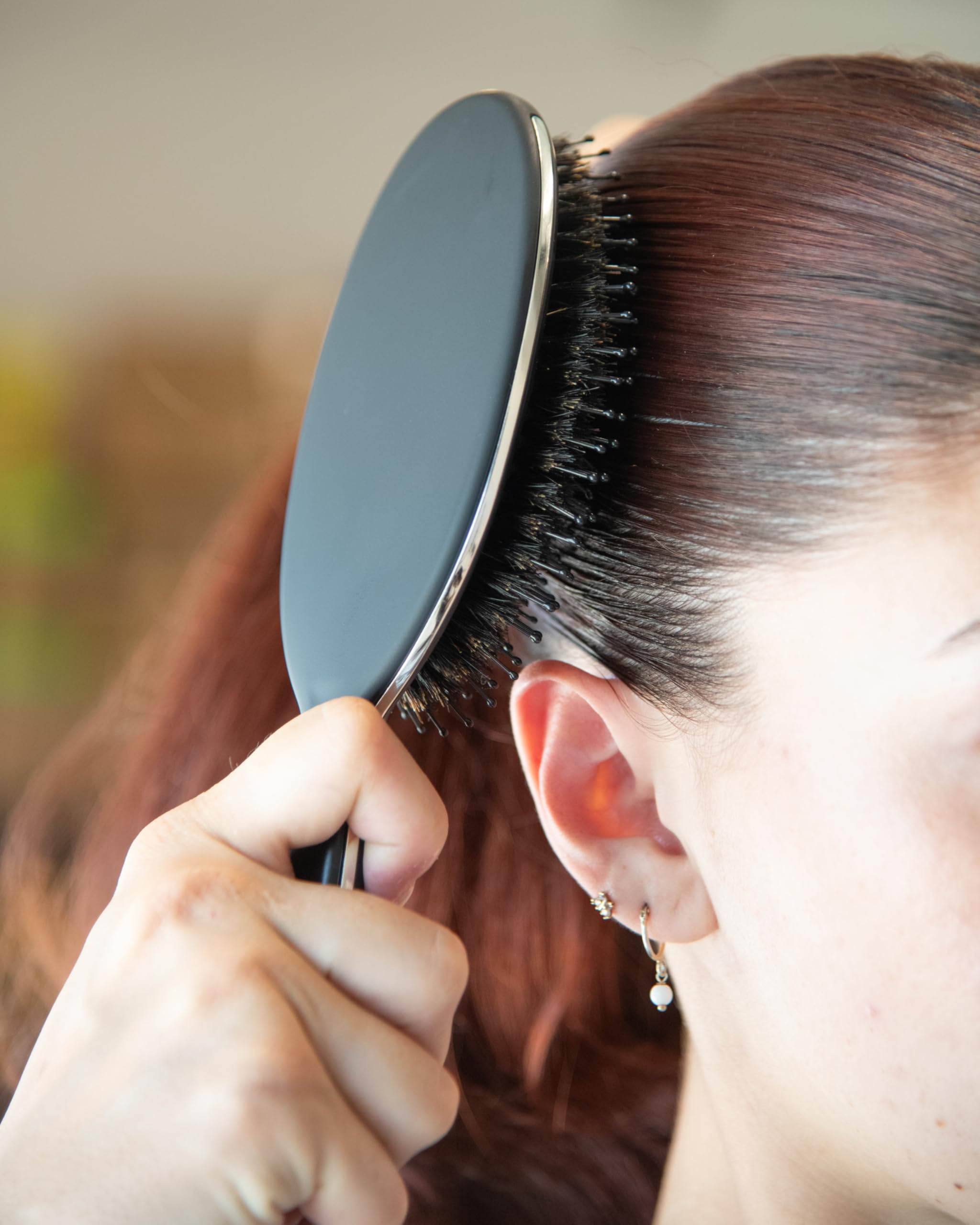 FRAMAR scalp-stimulation brush promotes healthy-looking scalp through light brushing