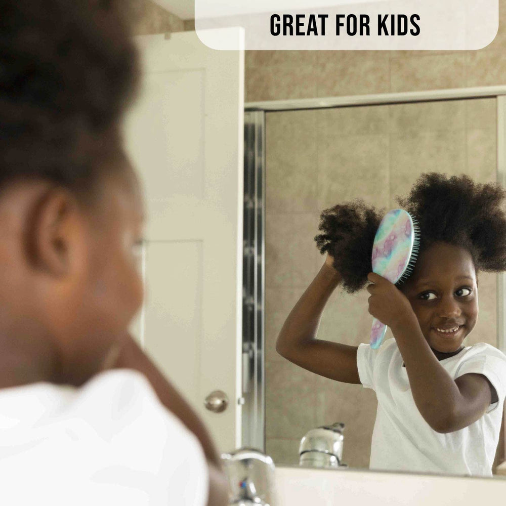 FRAMAR travel-size brush pictured for on-the-go detangling.