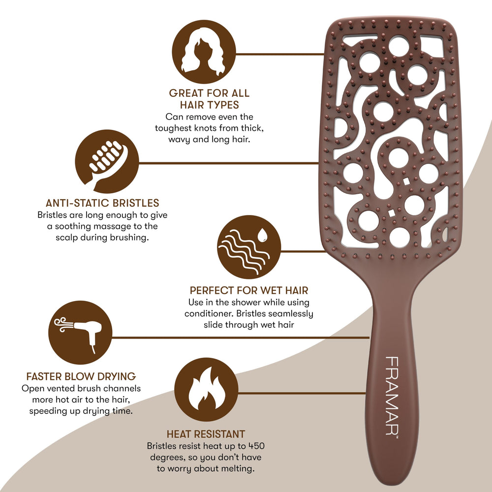 FRAMAR wet paddle brush for hair enhances detangling on wet locks.