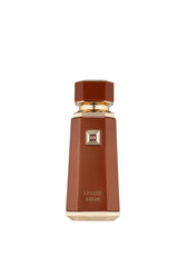 French Avenue Liquid Brun bottle closeup highlighting amber-vanilla warmth for everyday wear.