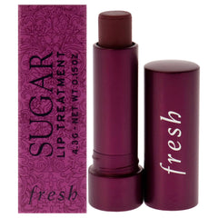 Fresh Sugar Lip Treatment en botella rosa para hidratación duradera