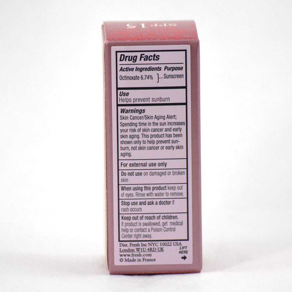 Sun protection icon with Fresh Sugar Lip Treatment Rose emphasizing SPF 15.