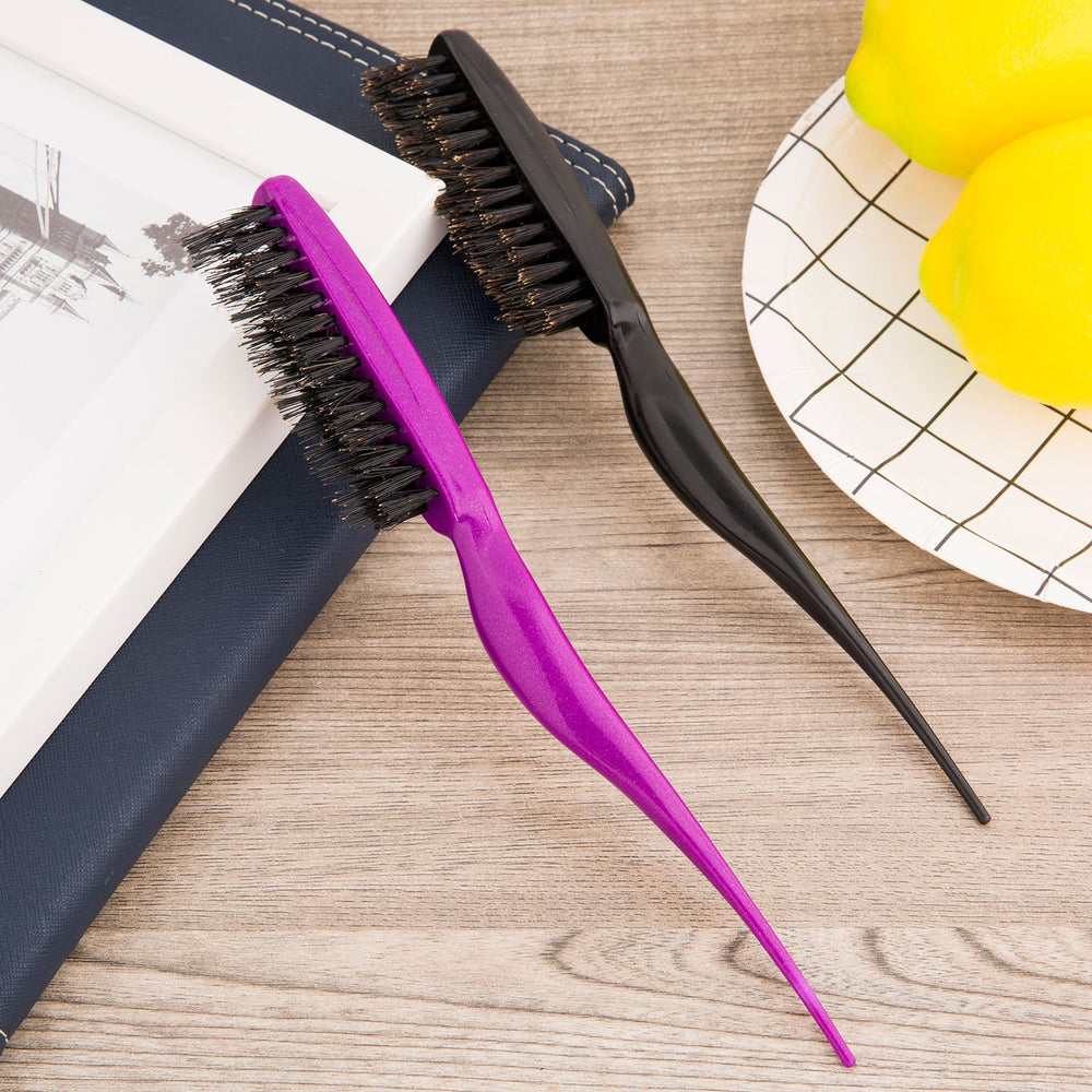 Frienda ergonomic purple-handle brush designed for comfortable backcombing.
