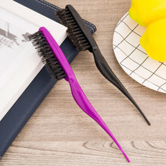 Frienda ergonomic purple-handle brush designed for comfortable backcombing.