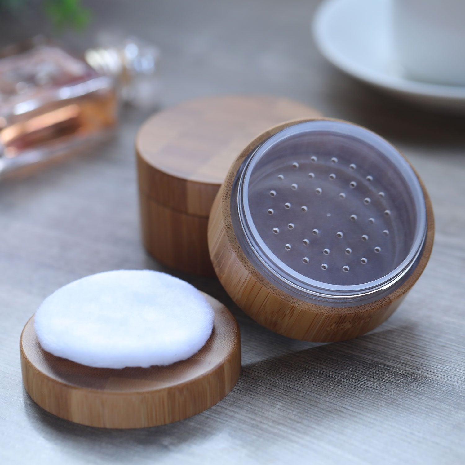 Frienda soft powder puff for smooth, comfortable application.