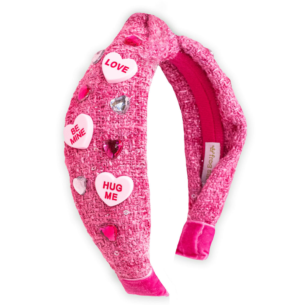 Diadema FROG SAC con nudo superior rosa para niñas, estilo cómodo.