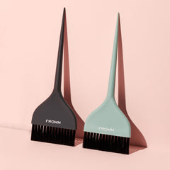 Fromm Color Studio brush with blunt tips penetrating root on thick hair.