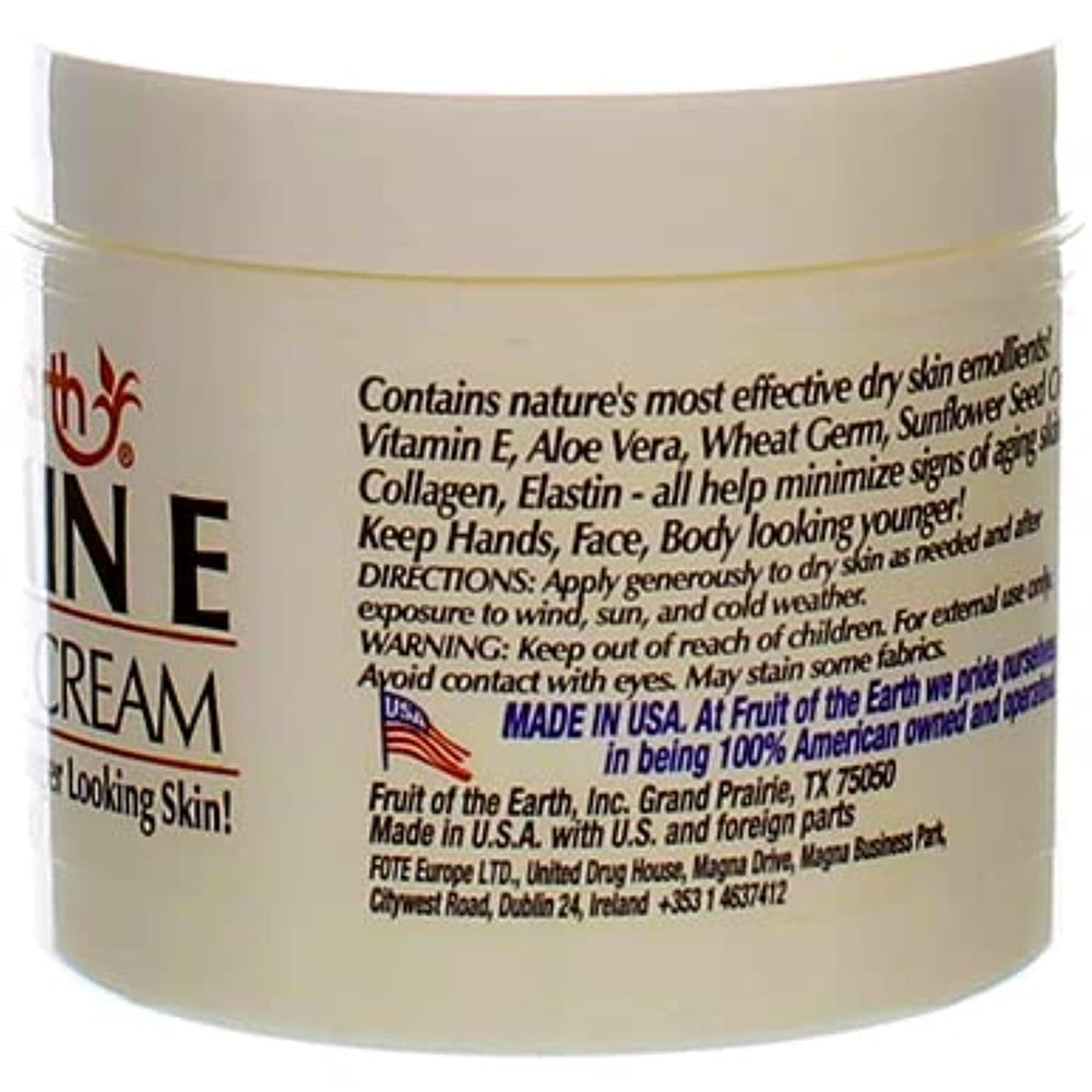 Fruit of the Earth Vitamin E Skin Care Cream on a bathroom shelf.