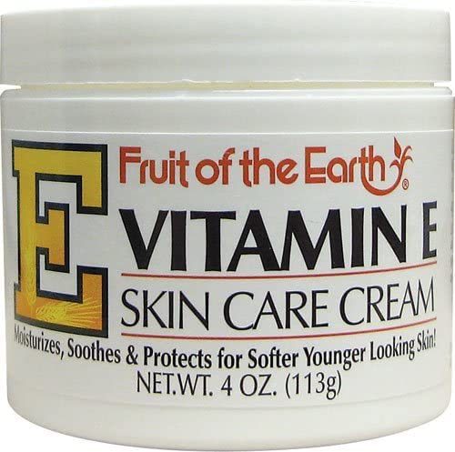 Fruit of the Earth Vitamin E Skin Care Cream jar closeup shows rich texture for quick absorption.