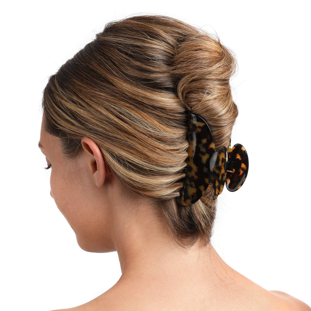 Pinzas Fsmiling con estampado leopardo, agarre seguro para cabellos variados.