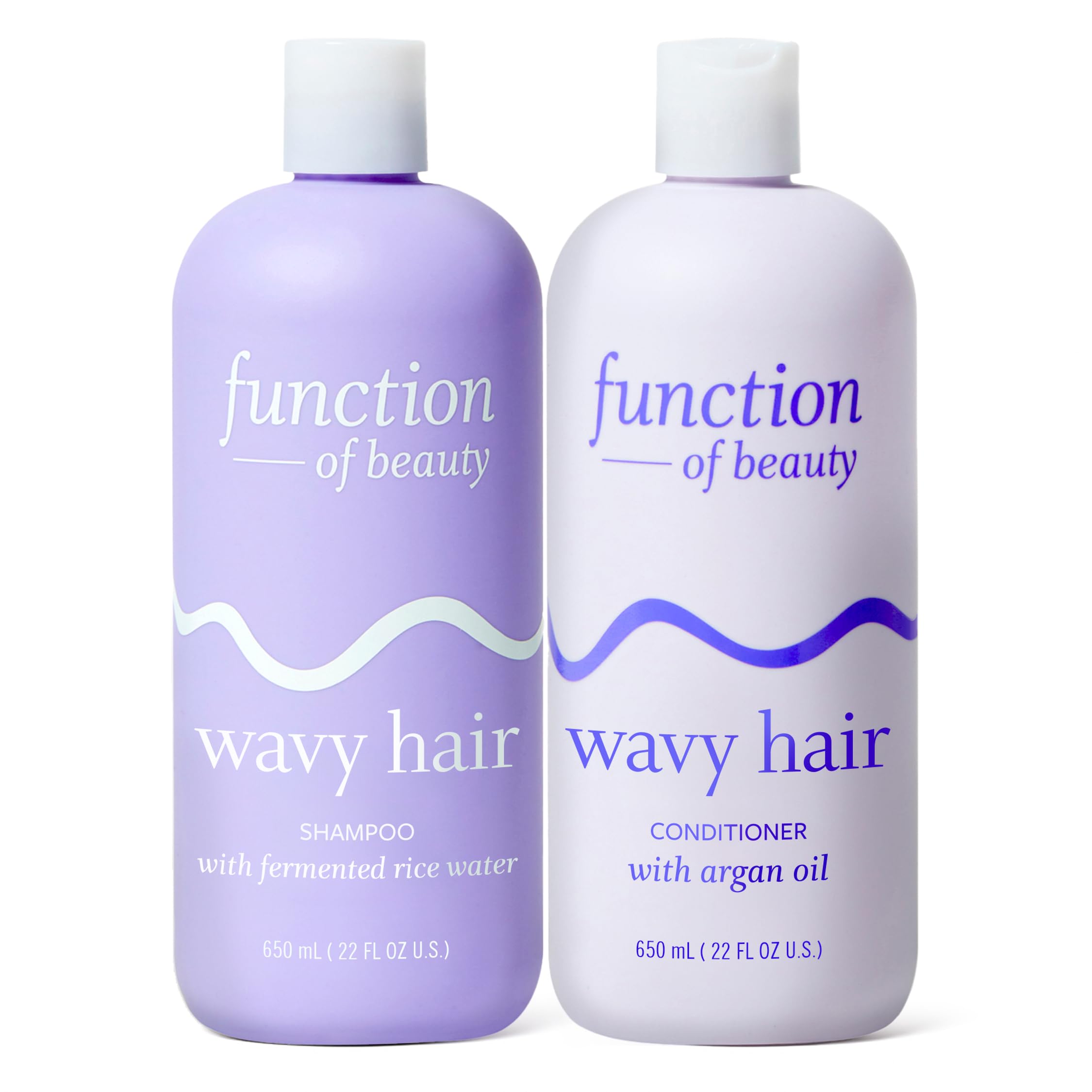 Function of Beauty Wavy Shampoo bottle pouring for lightweight cleansing and defined waves