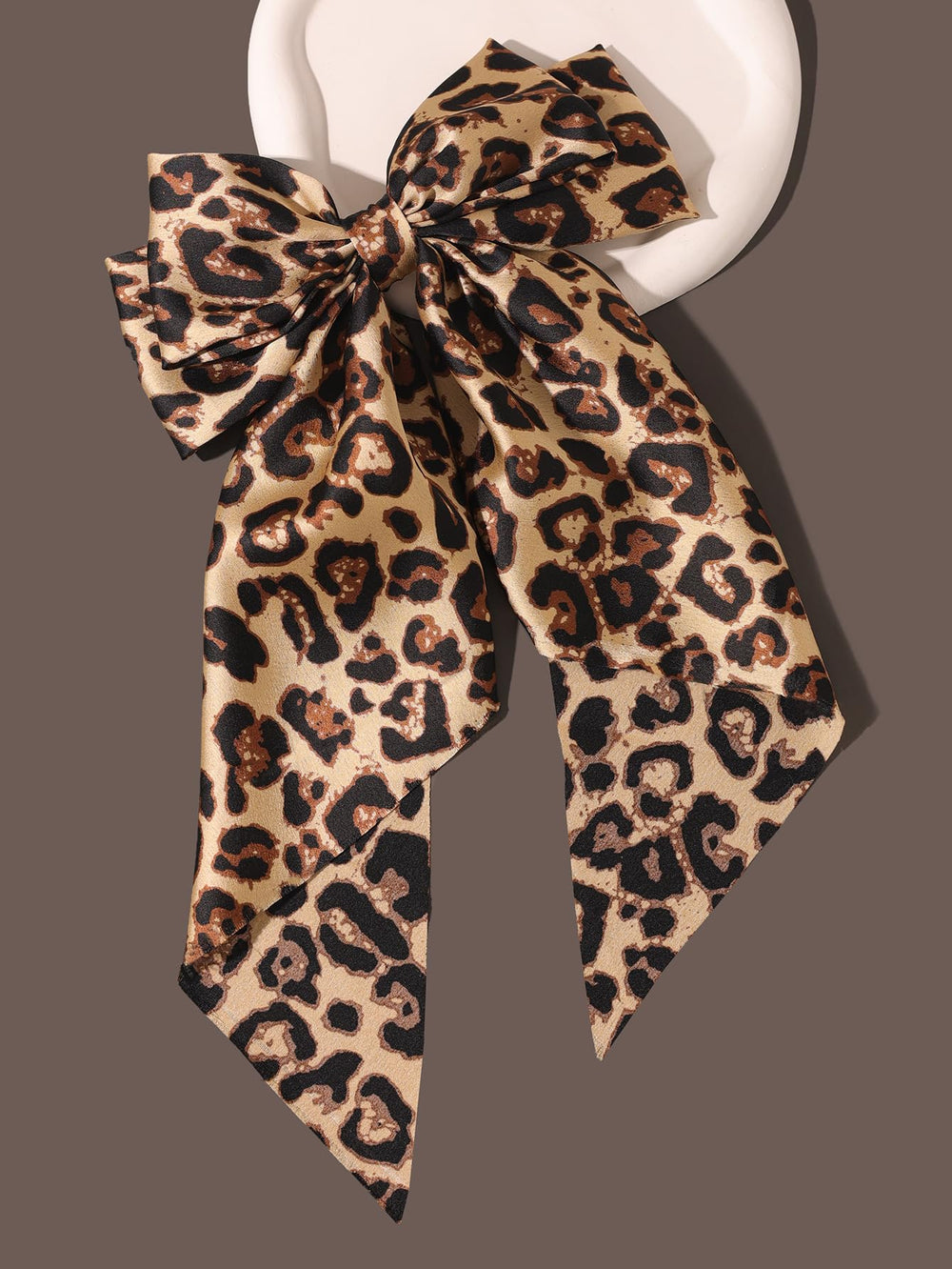 Furling Pompoms leopard bow packaging presents ready-to-gift appeal and chic presentation.