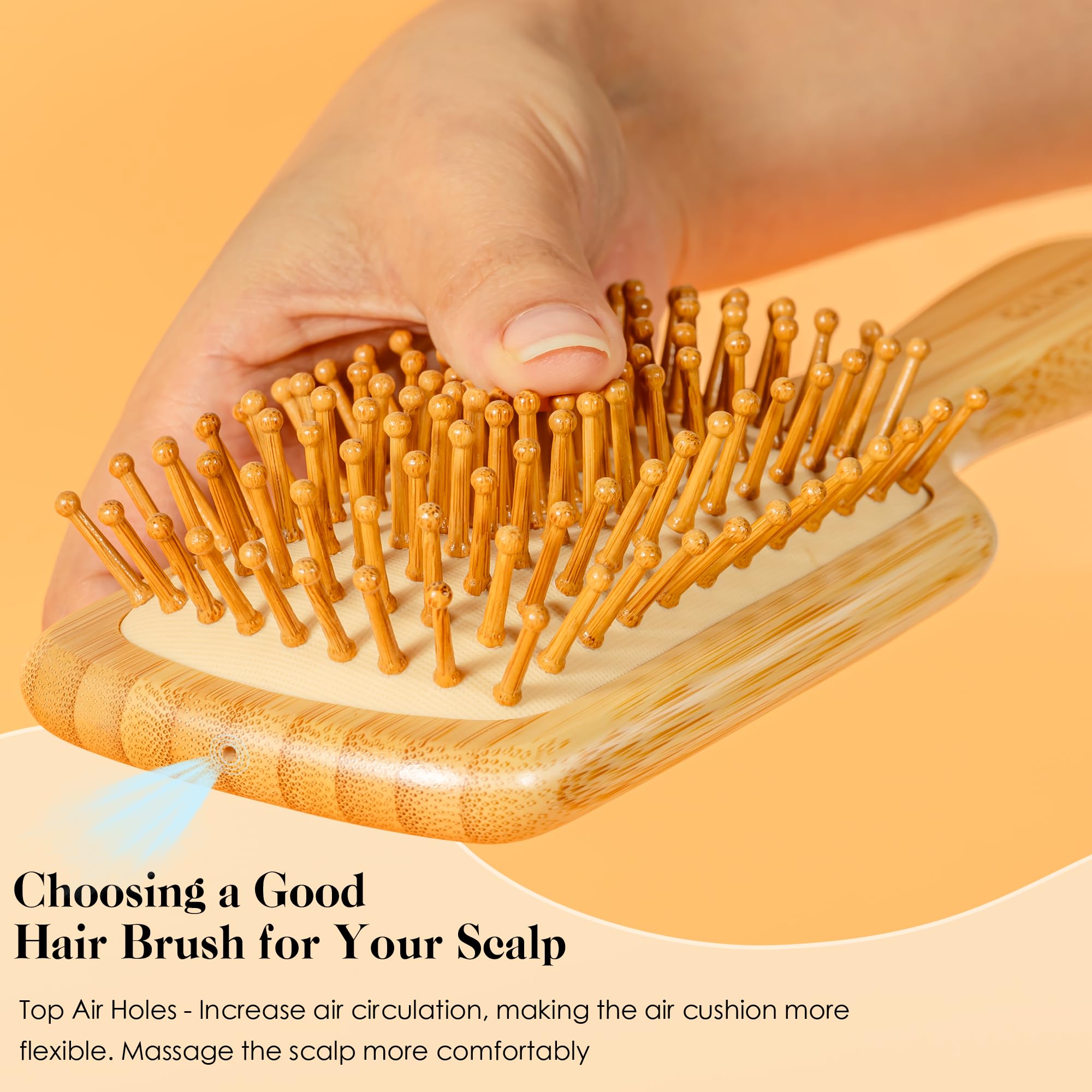 GAINWELL bamboo brush with rounded bristles detangles hair smoothly.