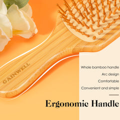 GAINWELL bamboo brush ergonomic handle designed for comfortable daily grooming.