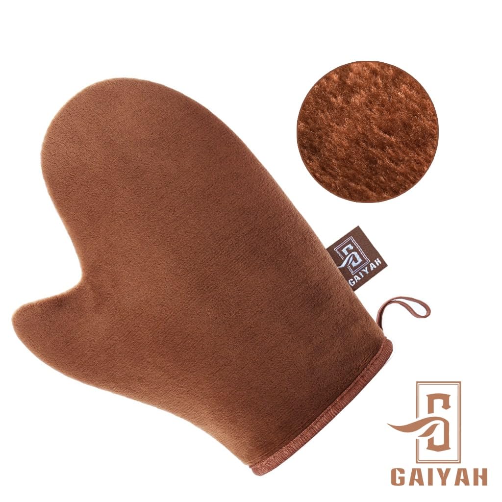 GAIYAH self tanning mitt with reversible design for versatile use on both hands.