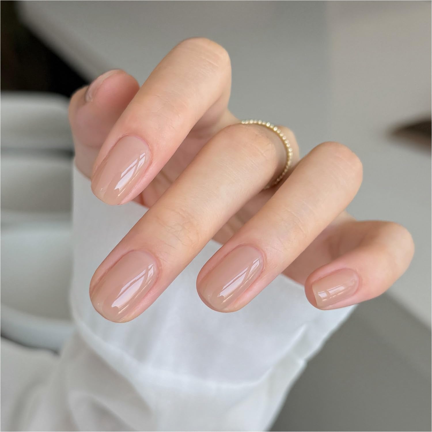GAOY Nude Jelly Gel Nail Polish bottle close-up shows buildable sheer color for DIY nails.