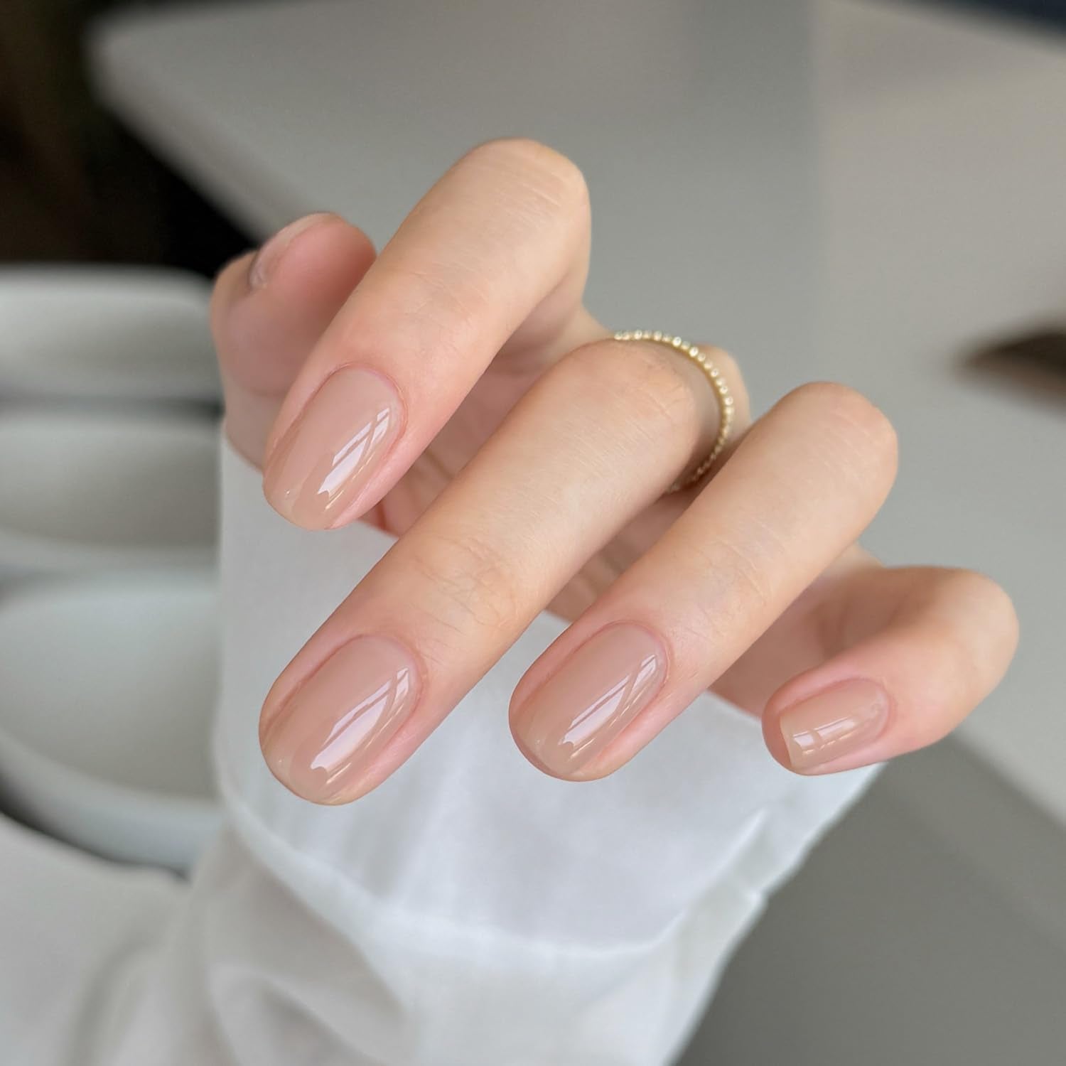 GAOY Nude Jelly Gel Nail Polish under UV light cure highlights quick 60-second drying.
