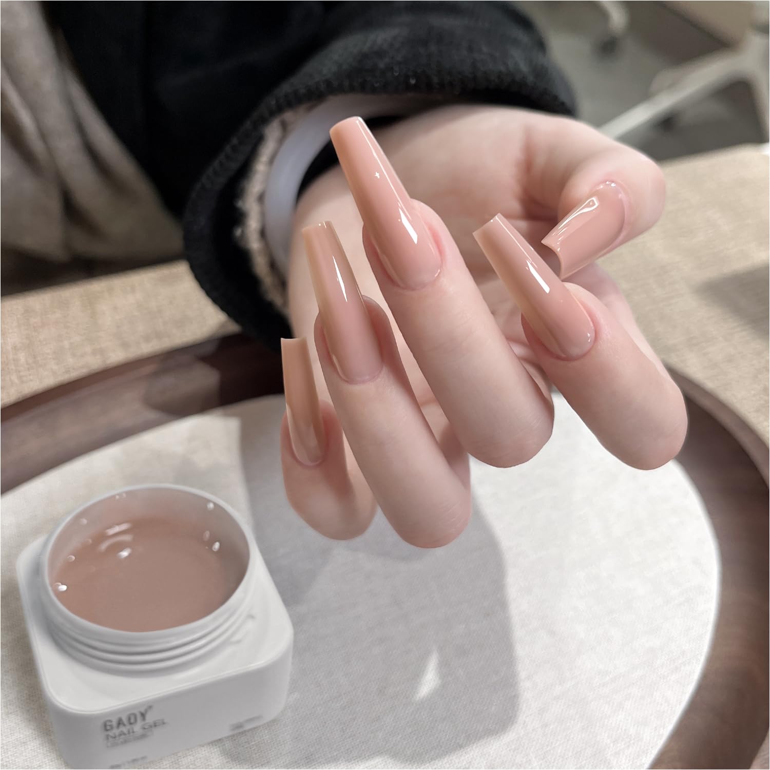 GAOY Watery Crystal Poly Gel for precise nail extension with natural-looking color.