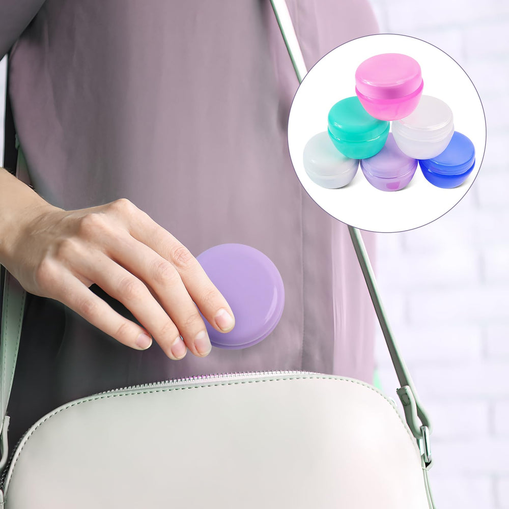 GAQWOK travel containers with spoons provide hygienic application on the go