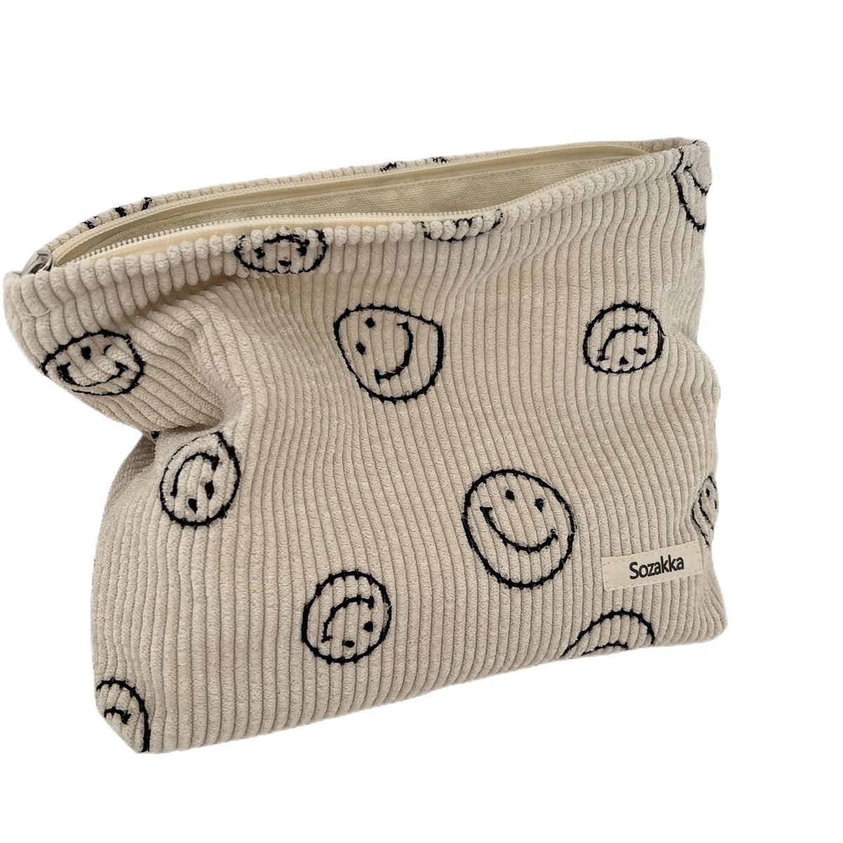 Gardsell corduroy cosmetic bag with smile dots, ideal for portable makeup storage on the go.
