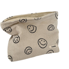 Gardsell corduroy cosmetic bag with smile dots, ideal for portable makeup storage on the go.