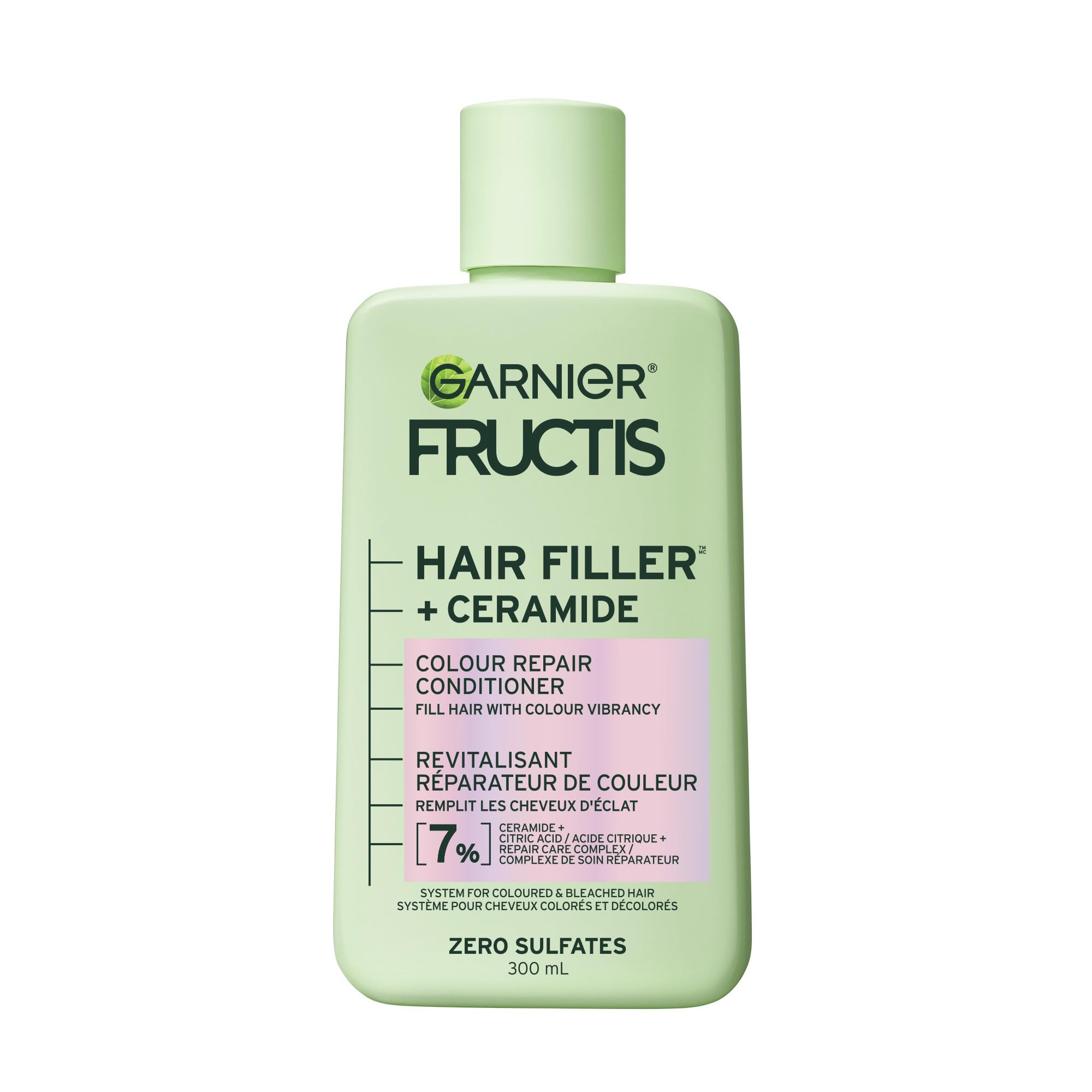 Garnier Fructis Hair Filler Ceramide conditioner bottle pour for vibrant color