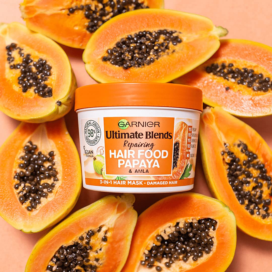 Garnier Alimento para el Cabello Papaya, ayuda a nutrir el cabello mojado al desenredar.