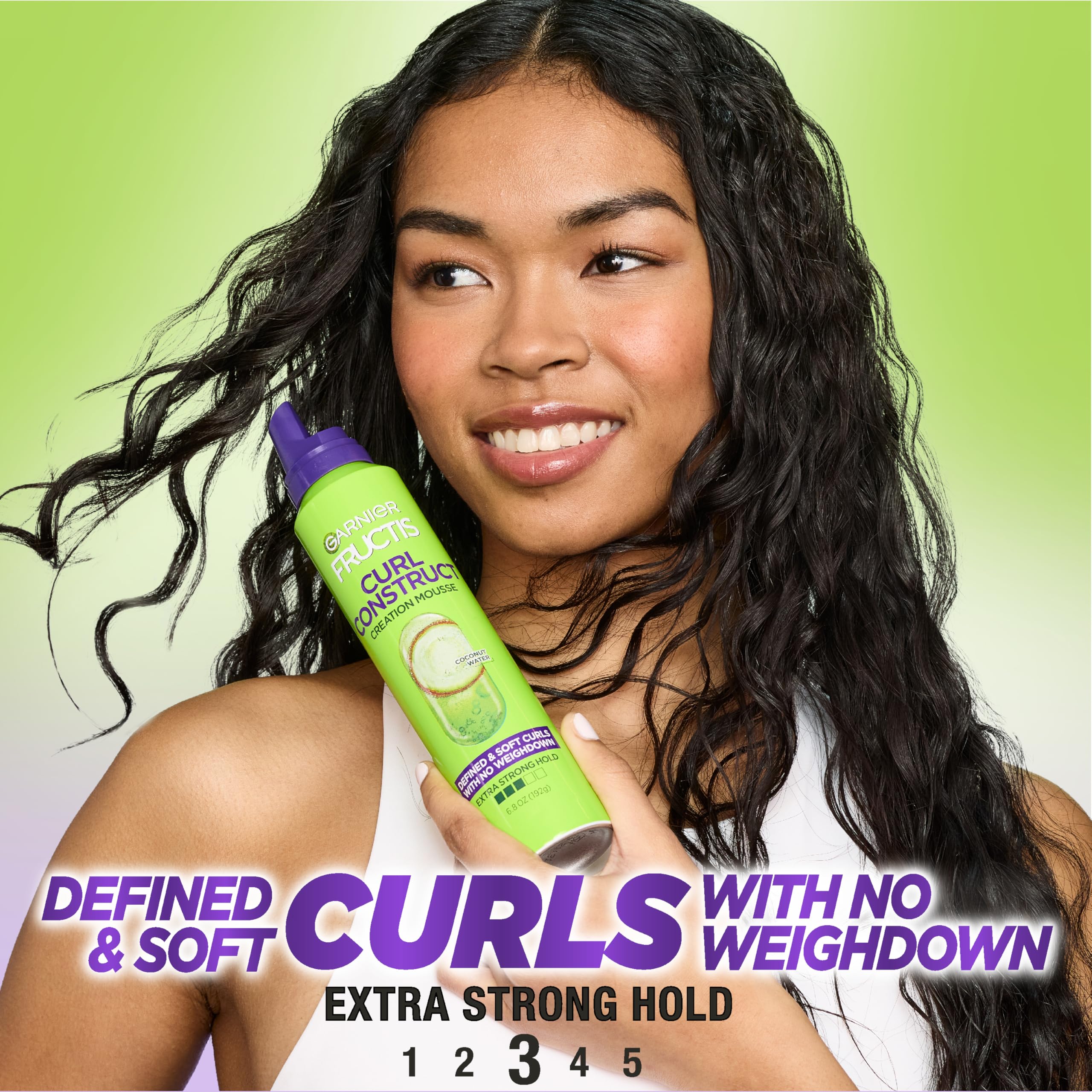 Garnier Fructis Curl Construct Mousse damp hair ready for shaping and definition.