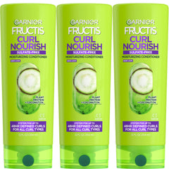 Garnier Fructis Curl Nourish, textura cremosa para rizos definidos y suaves.