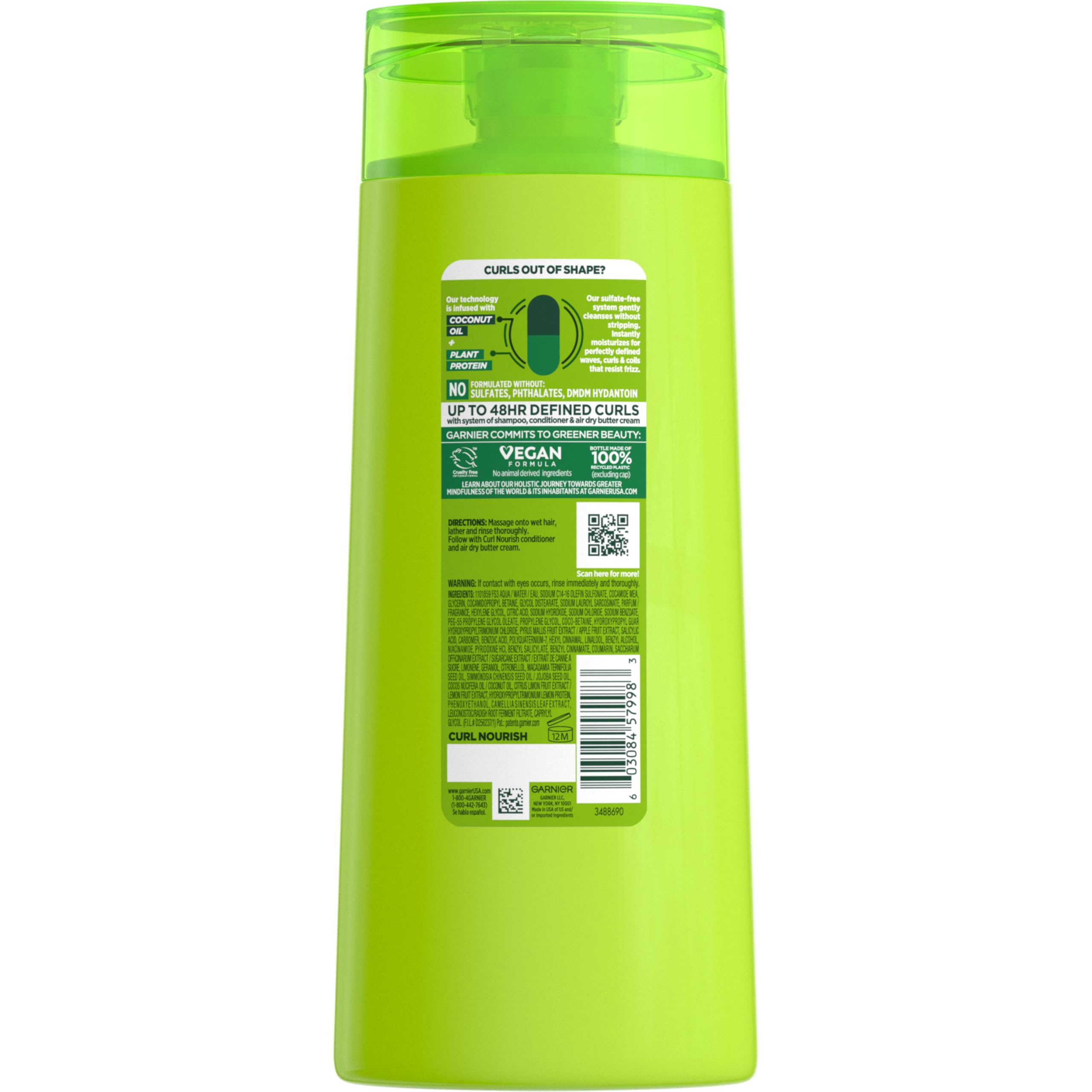Garnier Fructis curl nourishment shampoo application on wet hair.