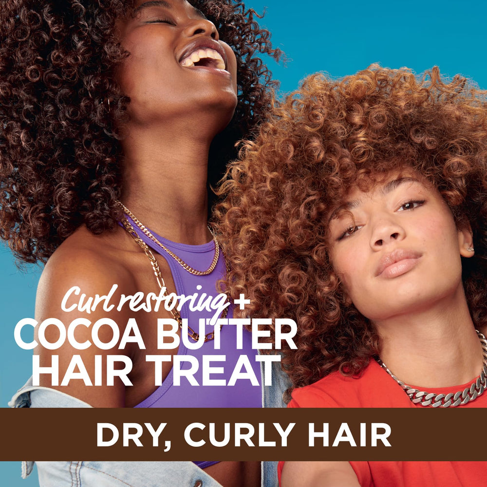 Garnier Fructis Cocoa Butter leave-in cream being applied for frizz control.